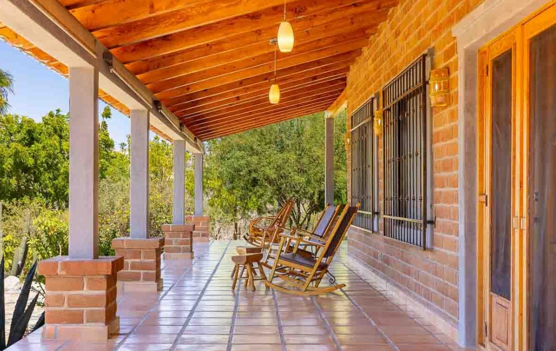 Timber and brick porch with rocking chairs